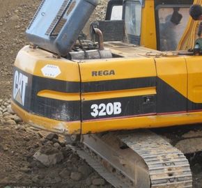 гусеница 320b использовала землечерпалку для seyche Сьерра-Леоне Фритауна Сенегала Дакара следа сбывания